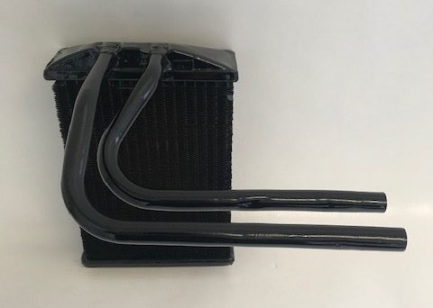 Värmeelement Ford är en värmeväxlare av metall med två böjda rör som sträcker sig utåt, designade för användning i värme- eller kylsystem.