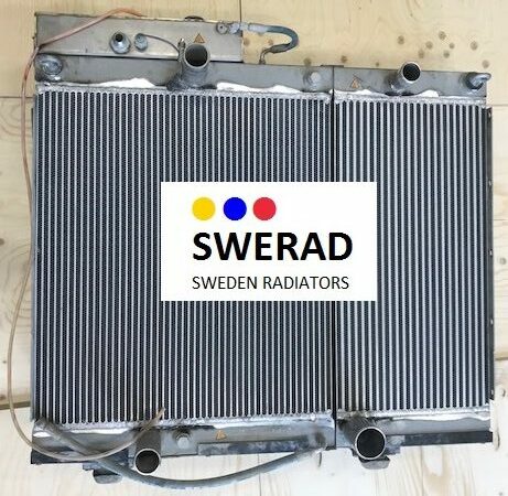 Två Intercooler Sandvik borrigg-enheter med ledningar fästa, läggs sida vid sida på en träyta, med en central logotyp för SWERAD Sweden Radiatorer.