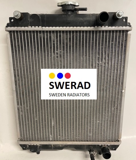 En bilkylare märkt som "Värmeelement Buick" av "SWERAD", med ett vitt klistermärke med "Sweden Radiators". Kylaren har in- och utloppsportar på sidorna och undersidan.